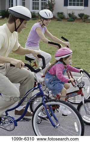 people, riding, outdoors, bicycles, family, daughter, helmets View Large Photo Image Stock Image - people, riding, outdoors, bicycles, family, daughter, helmets. Fotosearch