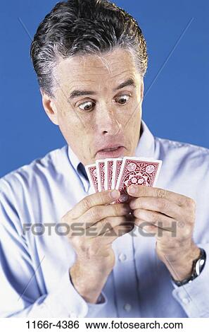 people, risk, Middle-aged, surprise, gambling, cards View Large Photo Image Stock Photograph - people, risk, Middle-aged, surprise, gambling, cards. Fotosearch