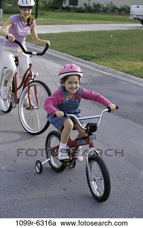 people, road, mother, riding, outdoors, bicycles, family View Large Photo Image Stock Image - people, road, mother, riding, outdoors, bicycles, family. Fotosearch