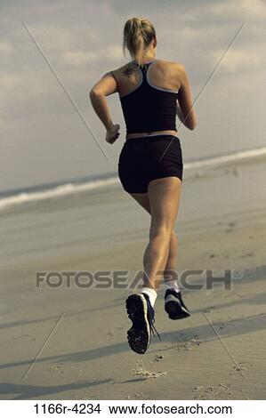 people, running, woman, beach, blond, Caucasian, run View Large Photo Image Picture - people, running, woman, beach, blond, Caucasian, run. Fotosearch