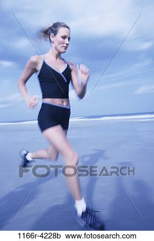 Stock Image - people, running, woman, beach, blond, Caucasian, run. Fotosearch