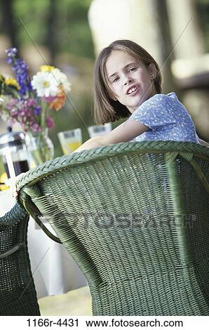 people, sitting, girl, flowers, outdoors, child, brunette View Large Photo Image Stock Image - people, sitting, girl, flowers, outdoors, child, brunette. Fotosearch
