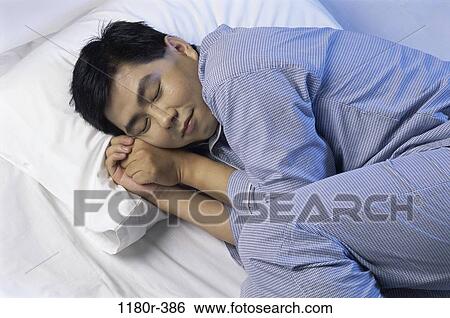 people, sleeping, Asian, bed, indoors, sleep View Large Photo Image Stock Photograph - people, sleeping, Asian, bed, indoors, sleep. Fotosearch