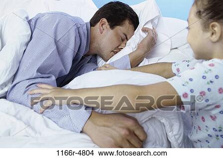 people, sleeping, bed, resting, family, tired View Large Photo Image Picture - people, sleeping, bed, resting, family, tired. Fotosearch
