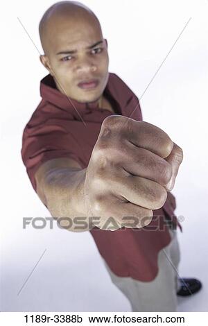 Stock Image - people, strength, confrontation, violence, angry. Fotosearch