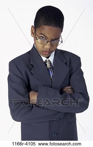 Stock Photography - people, suit, eyeglasses, defensive, boy, costume, business. Fotosearch