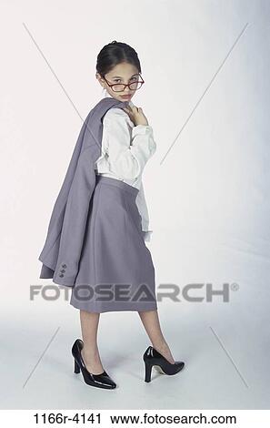 Stock Image - people, suit, eyeglasses, Hispanic, girl, costume, business. Fotosearch