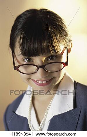 people, suit, eyeglasses, Hispanic, girl, business, humor View Large Photo Image Stock Image - people, suit, eyeglasses, Hispanic, girl, business, humor. Fotosearch