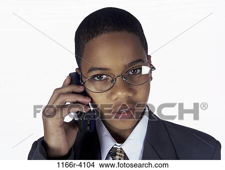 Picture - people, suit, talking, eyeglasses, phone, boy, business. Fotosearch