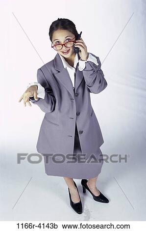 Stock Image - people, suit, talking, eyeglasses, Hispanic, phone, girl. Fotosearch