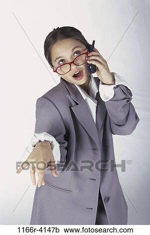 people, suit, talking, eyeglasses, Hispanic, phone, girl View Large Photo Image Stock Image - people, suit, talking, eyeglasses, Hispanic, phone, girl. Fotosearch
