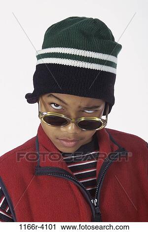 people, sunglasses, boy, child, posing, mischievous, indoors View Large Photo Image Stock Image - people, sunglasses, boy, child, posing, mischievous, indoors. Fotosearch