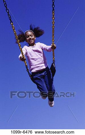 people, swinging, girl, swing, playground, outdoors, child View Large Photo Image Stock Photograph - people, swinging, girl, swing, playground, outdoors, child. Fotosearch
