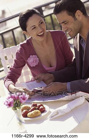 people, table, couple, map, Hispanic, fruit, book View Large Photo Image Stock Photo - people, table, couple, map, Hispanic, fruit, book. Fotosearch