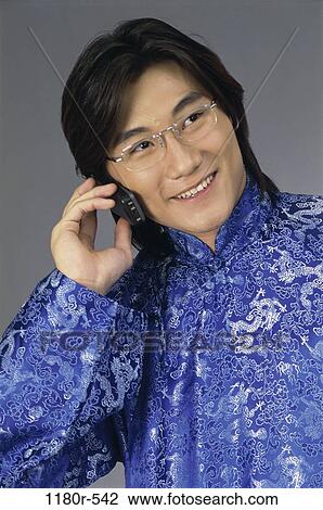 people, telephone, talking, Asian, eyeglasses, phone View Large Photo Image Stock Image - people, telephone, talking, Asian, eyeglasses, phone. Fotosearch