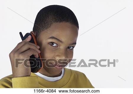people, telephone, talking, phone, boy, child, cell phone View Large Photo Image Picture - people, telephone, talking, phone, boy, child, cell phone. Fotosearch