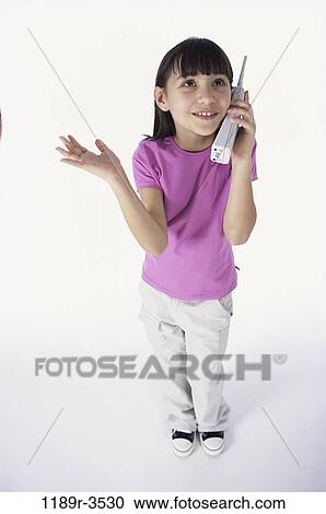 people, telephone, talking, phone, girl, child, brunette View Large Photo Image Stock Image - people, telephone, talking, phone, girl, child, brunette. Fotosearch