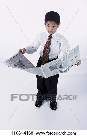 people, tie, newspaper, suit, Asian, reading, boy View Large Photo Image Stock Photo - people, tie, newspaper, suit, Asian, reading, boy. Fotosearch