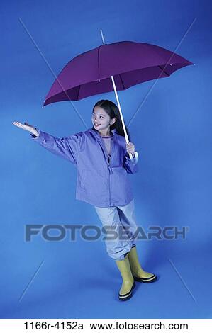 Stock Image - people, umbrella, girl, outdoors, weather, child, boots. Fotosearch