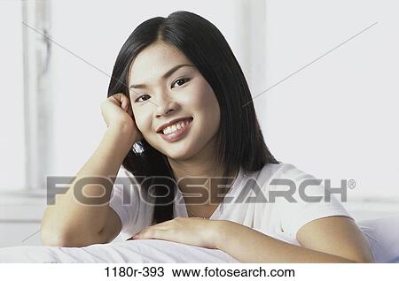 people, woman, Asian, brunette, indoors, young adult, Young women headshots indoors View Large Photo Image Stock Image - people, woman, Asian, brunette, indoors, young adult, Young women headshots indoors. Fotosearch