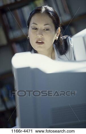 people, woman, Asian, concentrating, looking, computers, education View Large Photo Image Stock Image - people, woman, Asian, concentrating, looking, computers, education. Fotosearch