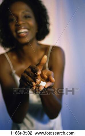 people, woman, beauty, lotion, brunette, indoors, African-American View Large Photo Image Stock Image - people, woman, beauty, lotion, brunette, indoors, African-American. Fotosearch