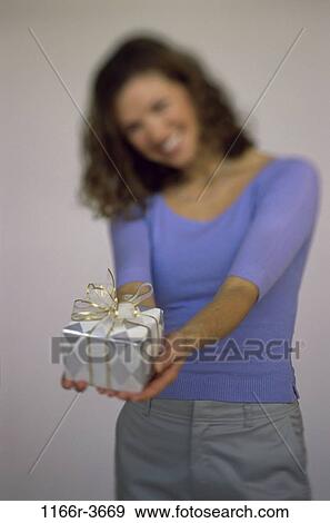 people, woman, birthday, gift, present, anniversary, giving View Large Photo Image Stock Photo - people, woman, birthday, gift, present, anniversary, giving. Fotosearch