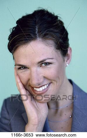 people, woman, brunette, indoors, headshot, Caucasian, young adult View Large Photo Image Stock Image - people, woman, brunette, indoors, headshot, Caucasian, young adult. Fotosearch