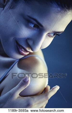 Stock Image - people, woman, brunette, indoors, Caucasian, young adult, Young women beauty. Fotosearch