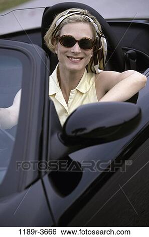 people, woman, car, convertible, sunglasses, outdoors, Caucasian View Large Photo Image Stock Photograph - people, woman, car, convertible, sunglasses, outdoors, Caucasian. Fotosearch