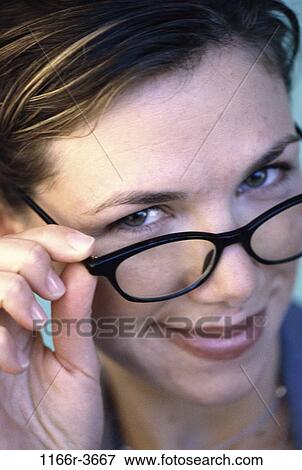people, woman, eyeglasses, brunette, indoors, headshot, Caucasian View Large Photo Image Stock Photo - people, woman, eyeglasses, brunette, indoors, headshot, Caucasian. Fotosearch
