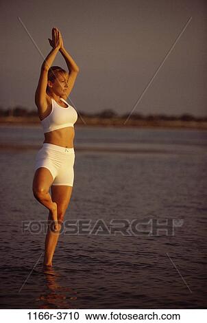 Stock Image - people, woman, healthy, beach, health, sports, exercise. Fotosearch
