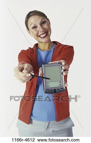 people, woman, Hispanic, computer, brunette, indoors, PDA View Large Photo Image Stock Image - people, woman, Hispanic, computer, brunette, indoors, PDA. Fotosearch