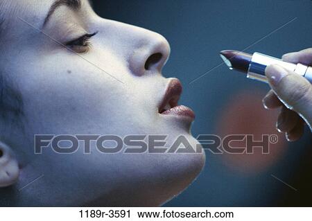 people, woman, Hispanic, makeup, lipstick, beauty, indoors View Large Photo Image Stock Image - people, woman, Hispanic, makeup, lipstick, beauty, indoors. Fotosearch