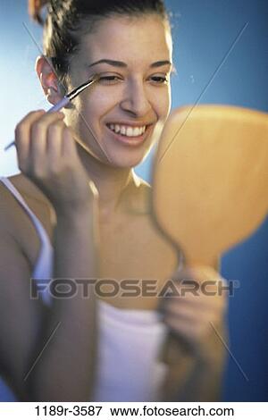 people, woman, Hispanic, mirror, makeup, beauty, brunette View Large Photo Image Stock Photo - people, woman, Hispanic, mirror, makeup, beauty, brunette. Fotosearch