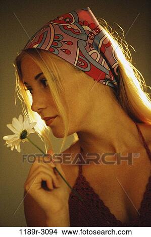 people, woman, pensive, bandana, blond, indoors, daisy View Large Photo Image Picture - people, woman, pensive, bandana, blond, indoors, daisy. Fotosearch