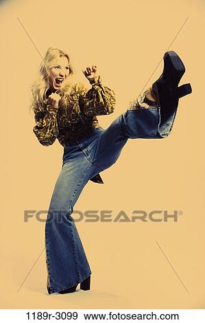 people, woman, shoes, confrontation, blond, angry, jeans View Large Photo Image Stock Photo - people, woman, shoes, confrontation, blond, angry, jeans. Fotosearch