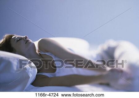 people, woman, sleeping, bed, indoors, Caucasian, sleep View Large Photo Image Picture - people, woman, sleeping, bed, indoors, Caucasian, sleep. Fotosearch