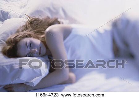 people, woman, sleeping, bed, indoors, Caucasian, sleep View Large Photo Image Stock Image - people, woman, sleeping, bed, indoors, Caucasian, sleep. Fotosearch