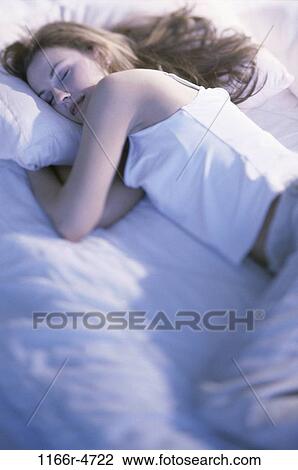 people, woman, sleeping, bed, Caucasian, sleep, young adult View Large Photo Image Stock Image - people, woman, sleeping, bed, Caucasian, sleep, young adult. Fotosearch
