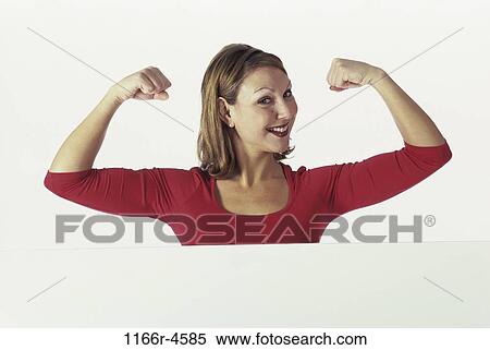 people, woman, strength, brunette, indoors, Caucasian, young adult View Large Photo Image Stock Photography - people, woman, strength, brunette, indoors, Caucasian, young adult. Fotosearch