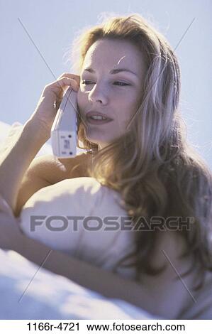 people, woman, telephone, talking, phone, cordless, indoors View Large Photo Image Stock Image - people, woman, telephone, talking, phone, cordless, indoors. Fotosearch