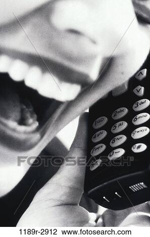 Stock Image - people, woman, telephone, talking, phone, cell phone, Caucasian. Fotosearch