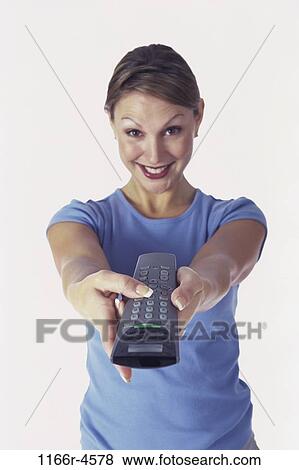 people, woman, watch, watching, television, brunette, remote View Large Photo Image Stock Photo - people, woman, watch, watching, television, brunette, remote. Fotosearch