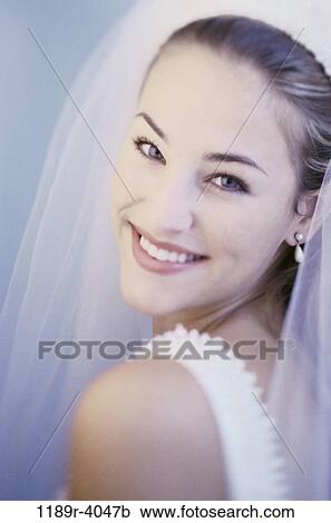 Stock Image - people, woman, wedding, veil, bride, marriage. Fotosearch