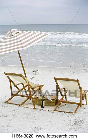 relaxation, water, umbrella, ocean, beach, coast, waves View Large Photo Image Stock Photo - relaxation, water, umbrella, ocean, beach, coast, waves. Fotosearch