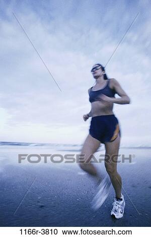 running, woman, beach, sunglasses, jogging, health, speed View Large Photo Image Stock Image - running, woman, beach, sunglasses, jogging, health, speed. Fotosearch