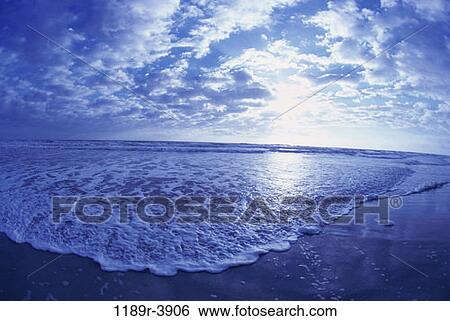 sky, sand, water, clouds, sunset, beach View Large Photo Image Stock Photograph - sky, sand, water, clouds, sunset, beach. Fotosearch