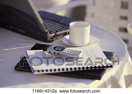 table, chair, coffee, computer, laptop, phone, folder View Large Photo Image Stock Image - table, chair, coffee, computer, laptop, phone, folder. Fotosearch