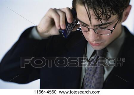 talking, eyeglasses, Hispanic, business, cell phone, businessman, indoors View Large Photo Image Stock Image - talking, eyeglasses, Hispanic, business, cell phone, businessman, indoors. Fotosearch